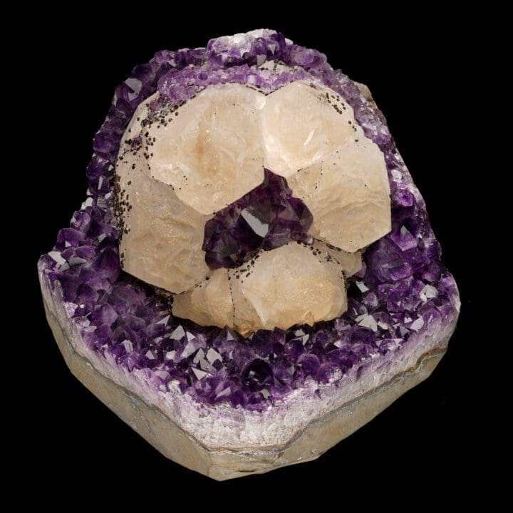 Calcite on Amethyst with Goethite