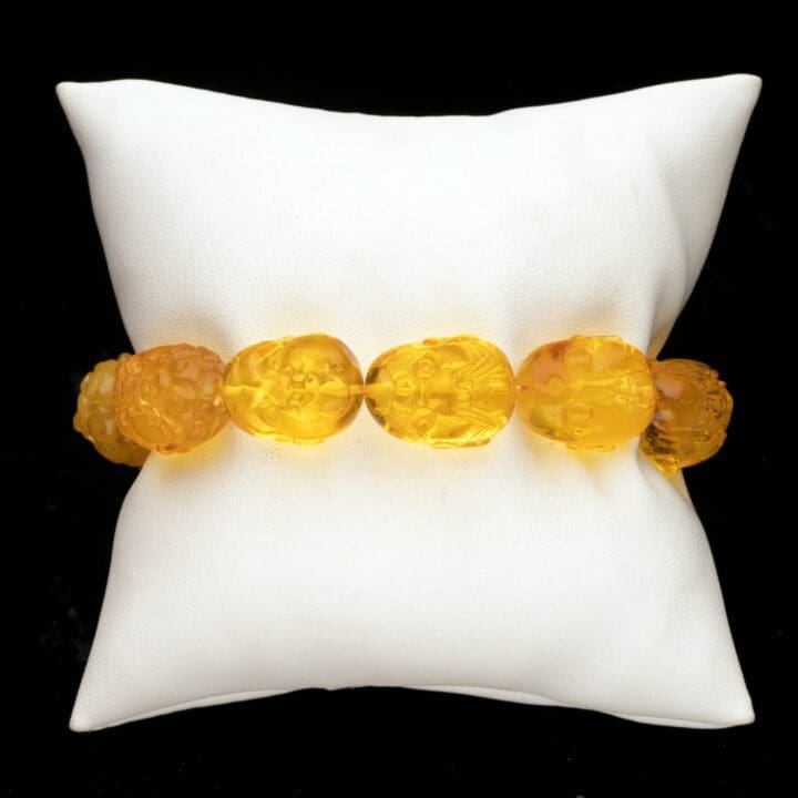 Hand-Carved Beaded Amber Buddha Bracelet // 28.94 Grams