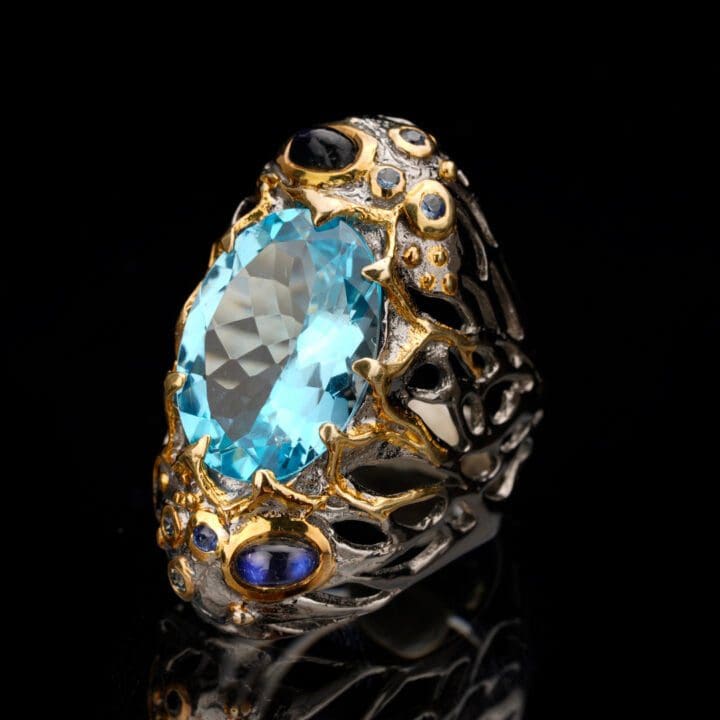 Blue Topaz, Spectrolite, and Sapphire Ring
